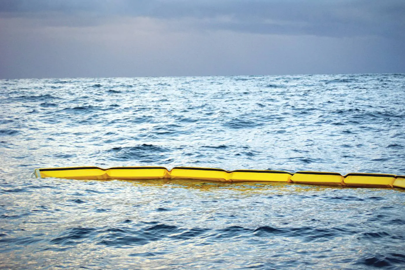 Solid Filled Containment Boom Deployed in the Ocean